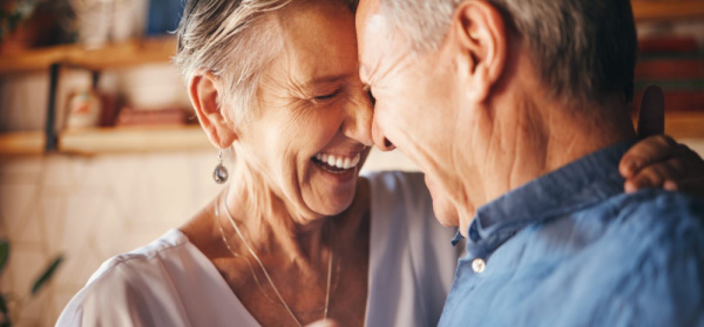 happy-senior-couple-dancing-at-home